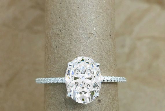 Luxury Jewelry 2017/2018 : Oval engagement ring. featuring diamonds and Forever brilliant moissanite.