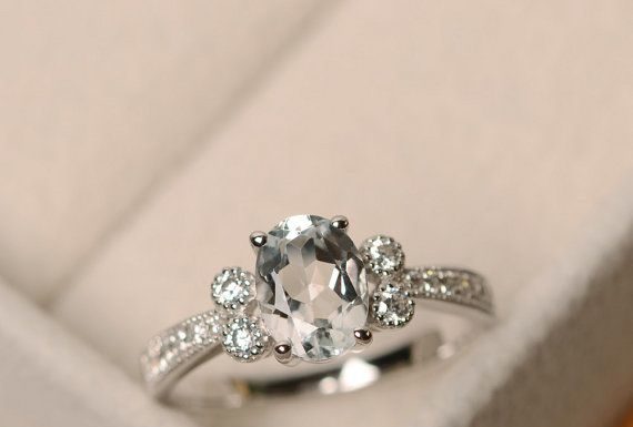 Luxury Jewelry 2017/2018 : This ring features a 6*8mm oval cut white topaz and sterling silver finished wit…