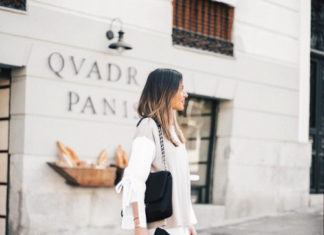 Street Style : Alba Hervas wears tight leather leggings with sleek black boots,…