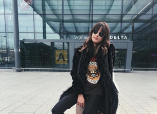 Street Style : Michelle’s travel style consists of leather leggings, a classic…