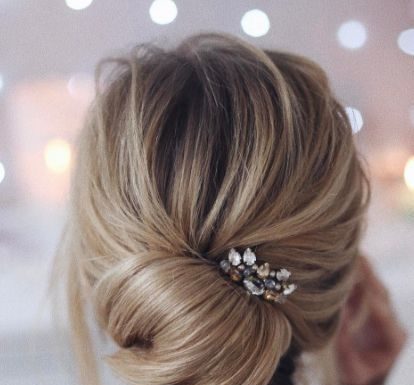 Trendy Hair Style : cute change up from a basic bun…
