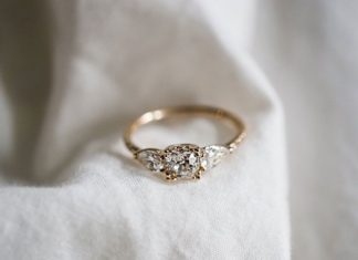 Engagement Rings & Wedding Rings : Bespoke diamond engagement ring with reclaimed pear shape side diamonds in recyc…