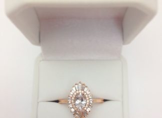 Engagement Rings & Wedding Rings : Pretty! The Lindy with sunburst motif and elongated oval shape. The center oval …