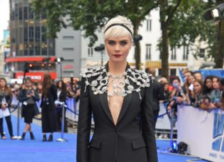 Fashion : CARA DELEVINGNE in this amazing crystal capelet + Burberry black…