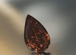 Loose Diamond : The Golden Maharaja: This large earth-hue diamond is a 65.57-carat gem listed as…