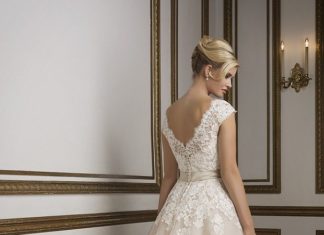 Short Wedding Dresses : A 1950's vintage inspired V-neckline tulle tea length ball gown rich in hue….