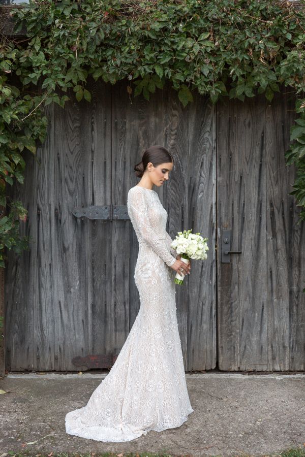 Elegant high neckline wedding dress: www.stylemepretty... Photography: Bia Sampa...