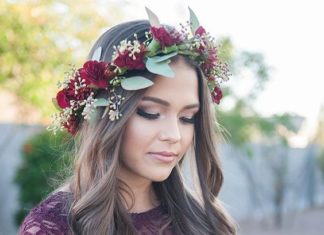 Best Hair Style For Bride : Bridesmaid wearing a burgundy lace dress and a jewel-toned floral crown made out…