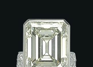 Diamond Rings : A DIAMOND RING The rectangular-cut diamond bezel set off-centered on a pavé-set…