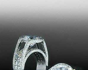 Diamond Rings : Bez Ambar two row blaze, split pave mounting with round brilliant center diamond…