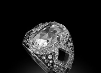 Diamond Rings : Carnet Harlequin Fantasy Ring with white diamonds set in platinum…