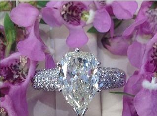 Diamond Rings : Pear shaped diamond engagement ring….