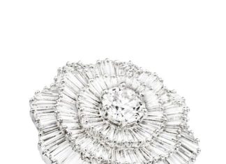 Diamond Rings : Ring in 18K white gold set with 128 baguette-cut diamonds and one brilliant-cut…