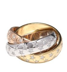 Diamond Rings : The Cartier Trinity ring with 100 diamond stars, one for each year the jeweler h…