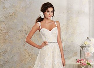 Short Wedding Dresses : A delicately romantic lace wedding dress featuring a tiered hi-low hemline and d…