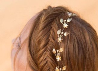 Wedding Hair With Flowers & jewels : Girl with braided bun & gold metal flower headband…