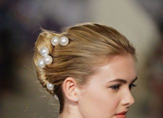 Wedding Hair With Flowers & jewels : A chic French twist adorned in pearls….