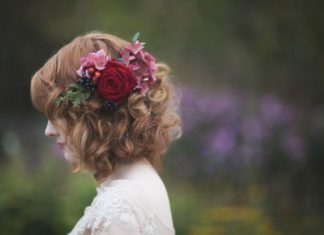 Wedding Hair With Flowers & jewels : Fresh flowers and berries in loosely curled hair | Photography by www.melissabea…