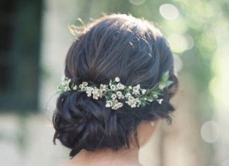 Wedding Hair With Flowers & jewels : Style Me Pretty on Instagram: “Loving this messy bun detailed with tiny wax fl…