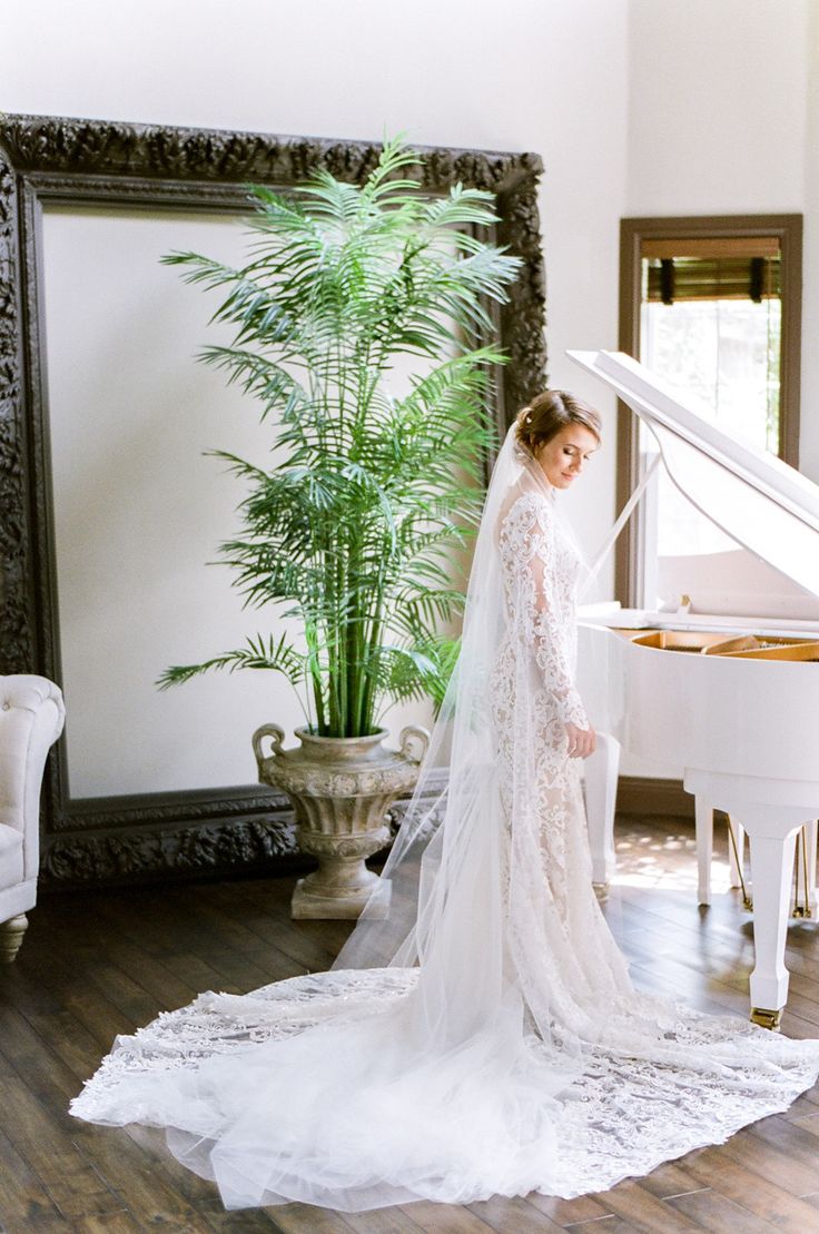 Lace embroidered long sleeve wedding gown: Photography: Tamara Gruner Photograph...