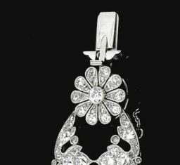 Best Diamond Bracelets : A bracelet of open work and floral design, millegrain set with rose-, single- an…