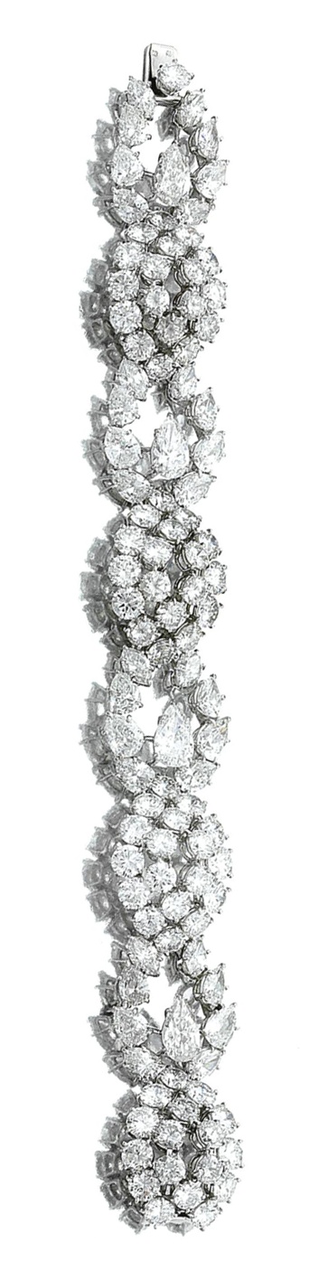 DIAMOND BRACELET, HARRY WINSTON. The articulated band designed as a series of m...