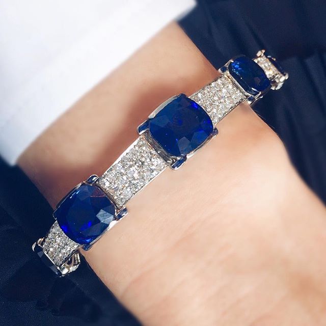 This bracelet has it all. It's Cartier and set with a series of Kashmir Sapp...