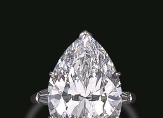 Diamond Rings : A HIGHLY IMPORTANT SINGLE-STONE DIAMOND RING, BY HARRY WINSTON Set with a marqui…