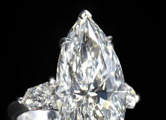 Diamond Rings : A marquise-cut diamond, weighing 13.41 carats with remaining diamonds approximat…