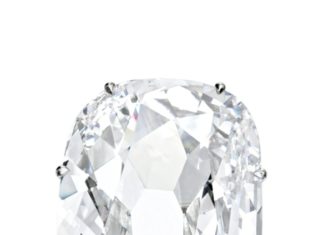Diamond Rings : AN EXCEPTIONALLY RARE DIAMOND RING. The old mine cushion-shaped diamond weighi…