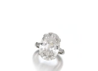 Diamond Rings : Diamond ring, Bulgari The oval diamond weighing 9.09 carats, between tapered bag…