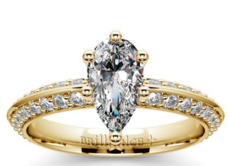 Diamond Rings : The sparkling Knife Edge Pear Diamond Ring in classic Yellow Gold: the perfect e…