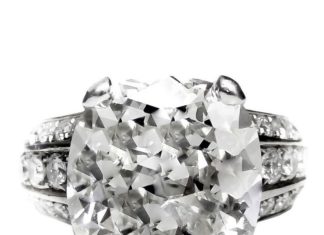 Diamond Rings : Unique Cushion Diamond Engagement Ring showcases a magnificent 10.73-carat, GIA-…