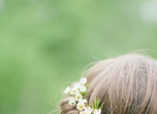 Wedding Hair With Flowers & jewels : Bridal updo with small white flowers // Carly Short Photography // www.theknot.c…