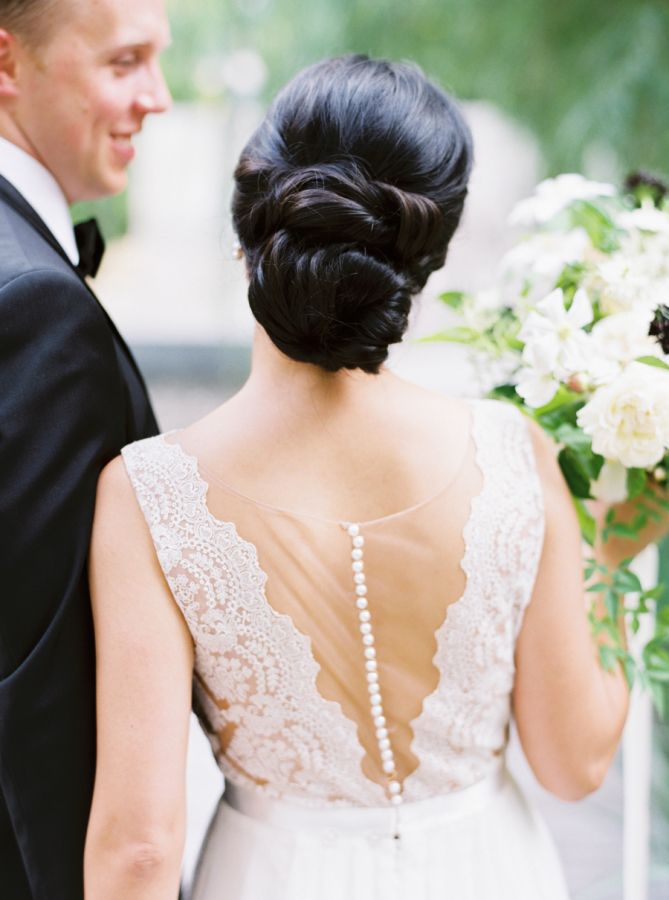 Pearl button back illusion lace wedding dress: www.stylemepretty... | Photograph...