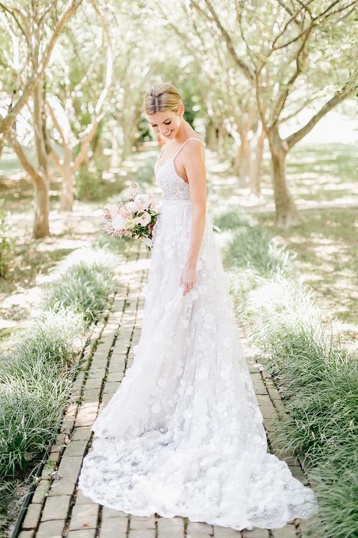 In LOVE with this intricate #SpaghettiStrap #WeddingDress by #Berta. See the ful...