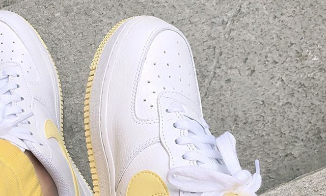 nike air force 1 07 womens : Yellow lemon and white Nike Air Force 1 ’07 LV8 sneakers.
