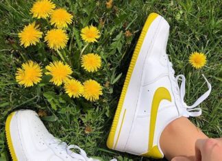 nike air force 1 shoes : Yellow and white Nike Air Force 1 sneakers.